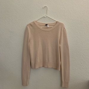 Pink cropped knit sweater